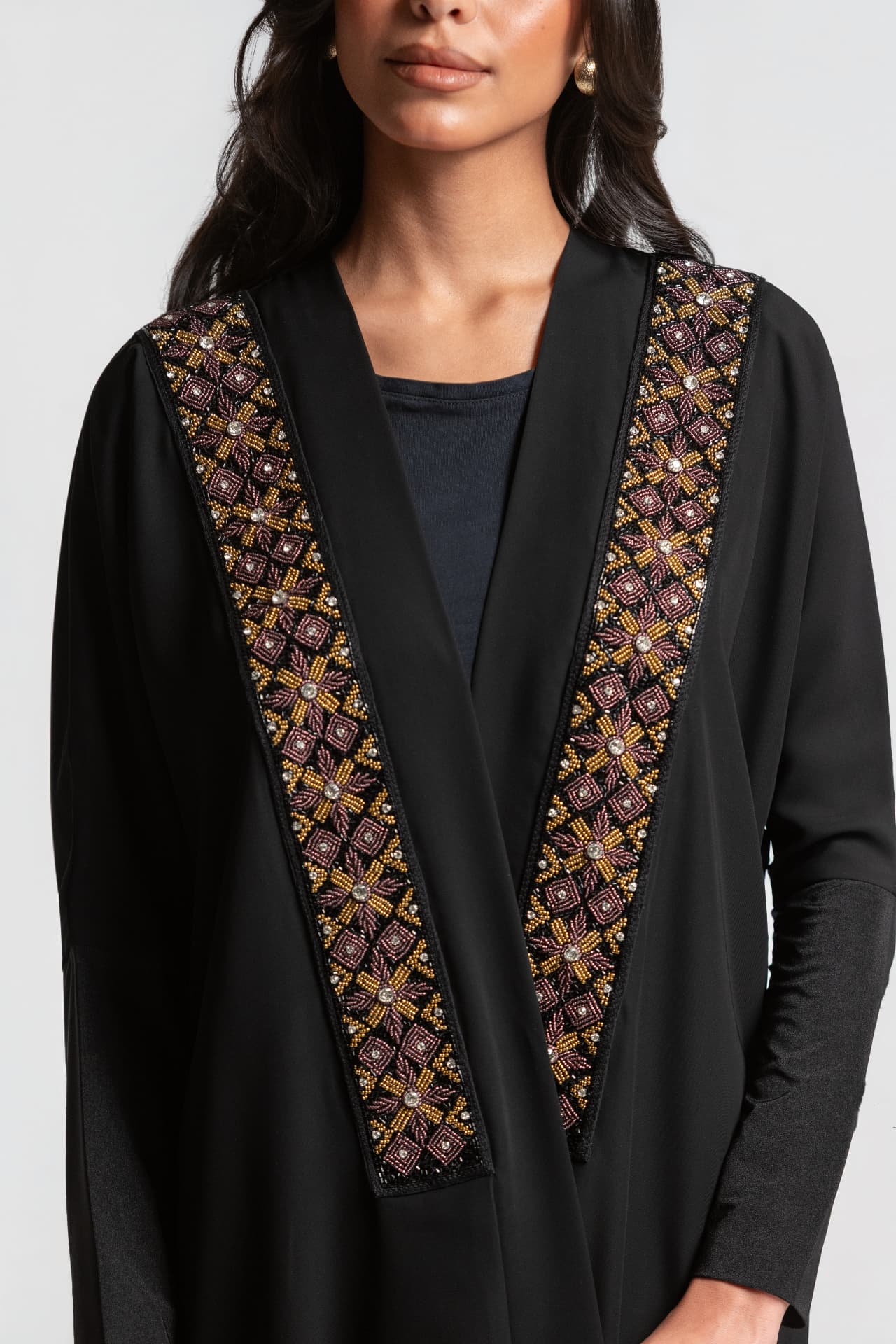 Burgundy and gold embroidered lapel detail